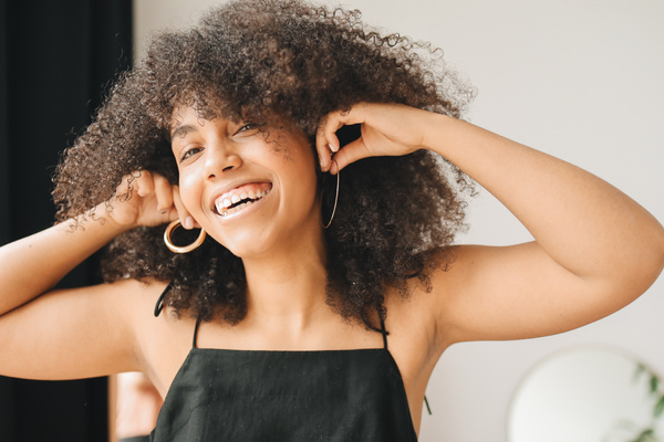 Woman in Black Tube Top Smiling